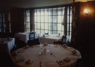 Tables await breakfast guests